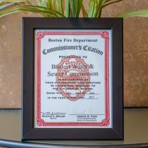 An award from the Boston Fire Department Commissioner for Outstanding Civilian Service